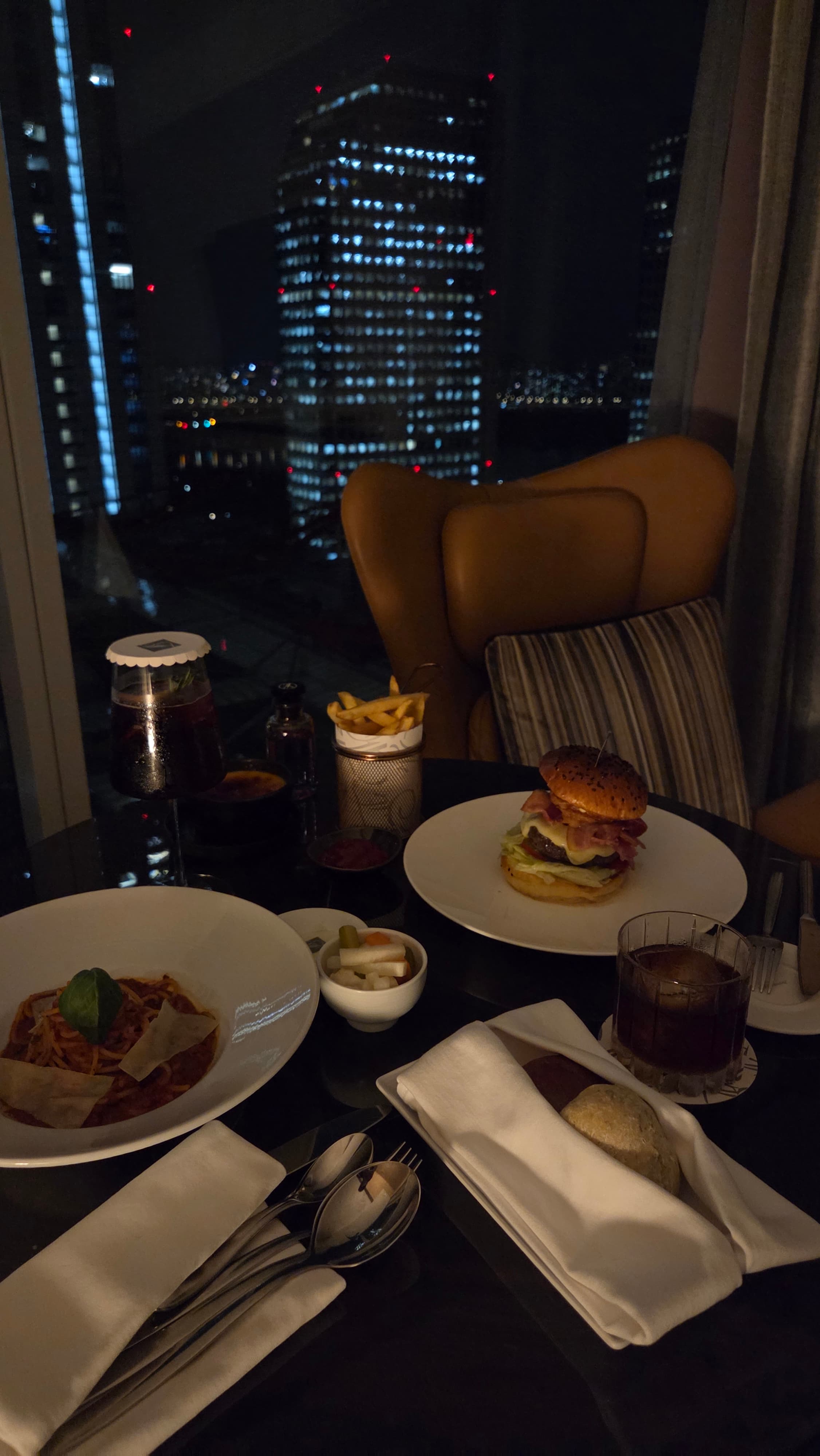 Night table and city view at Fairmont Ambassador Seoul