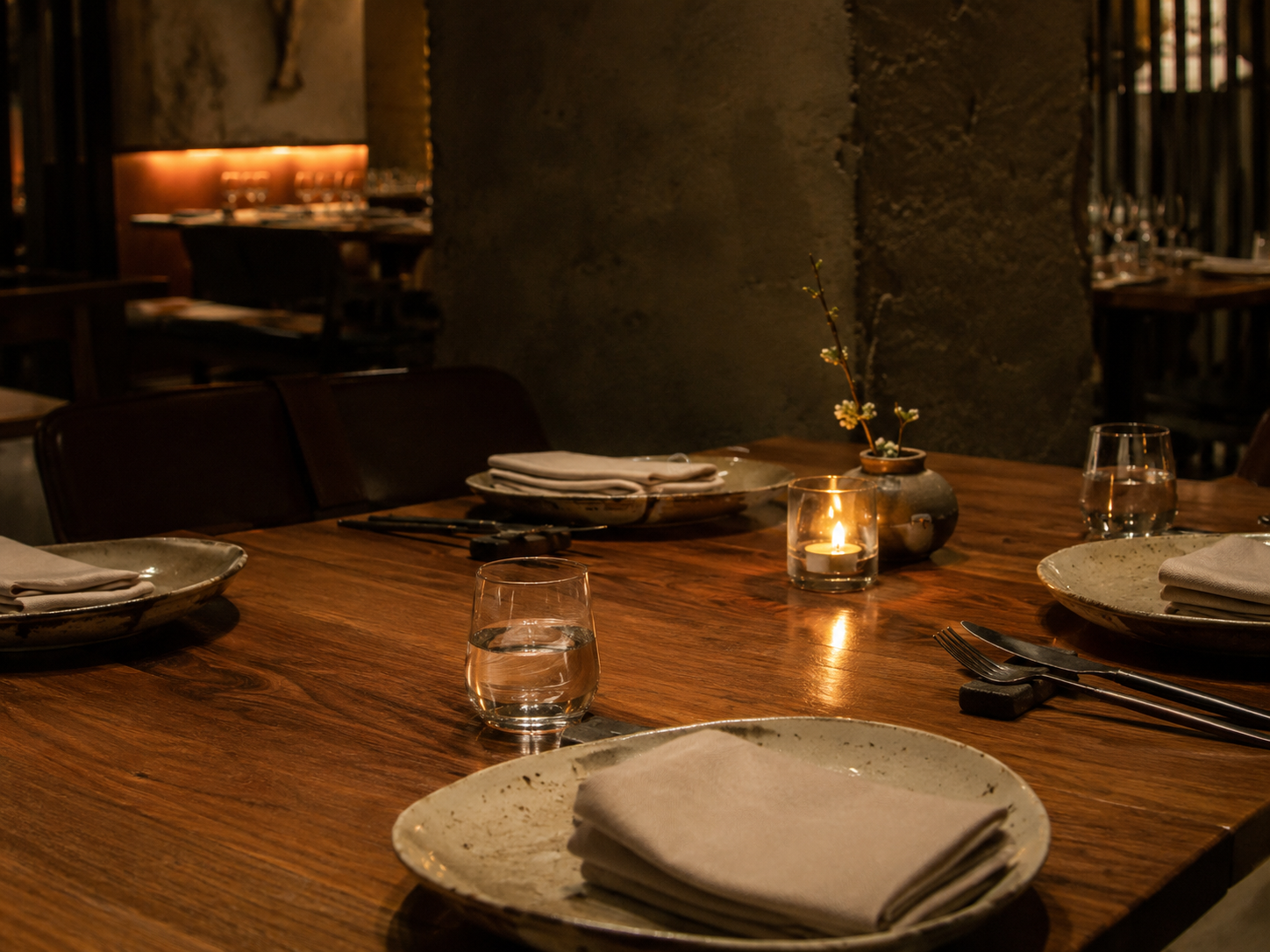 A restrained dining table prepared before evening service.